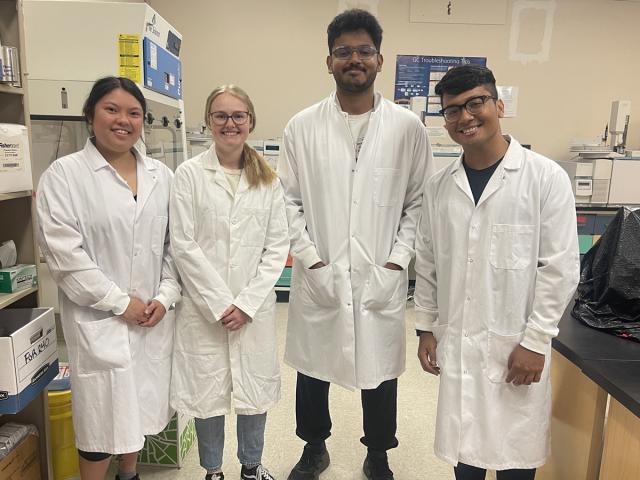 Forensic Science students pose for a photo in the lab
