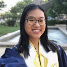 headshot of Public Health Certificate student Ellaine Arroyo in graduation gown 